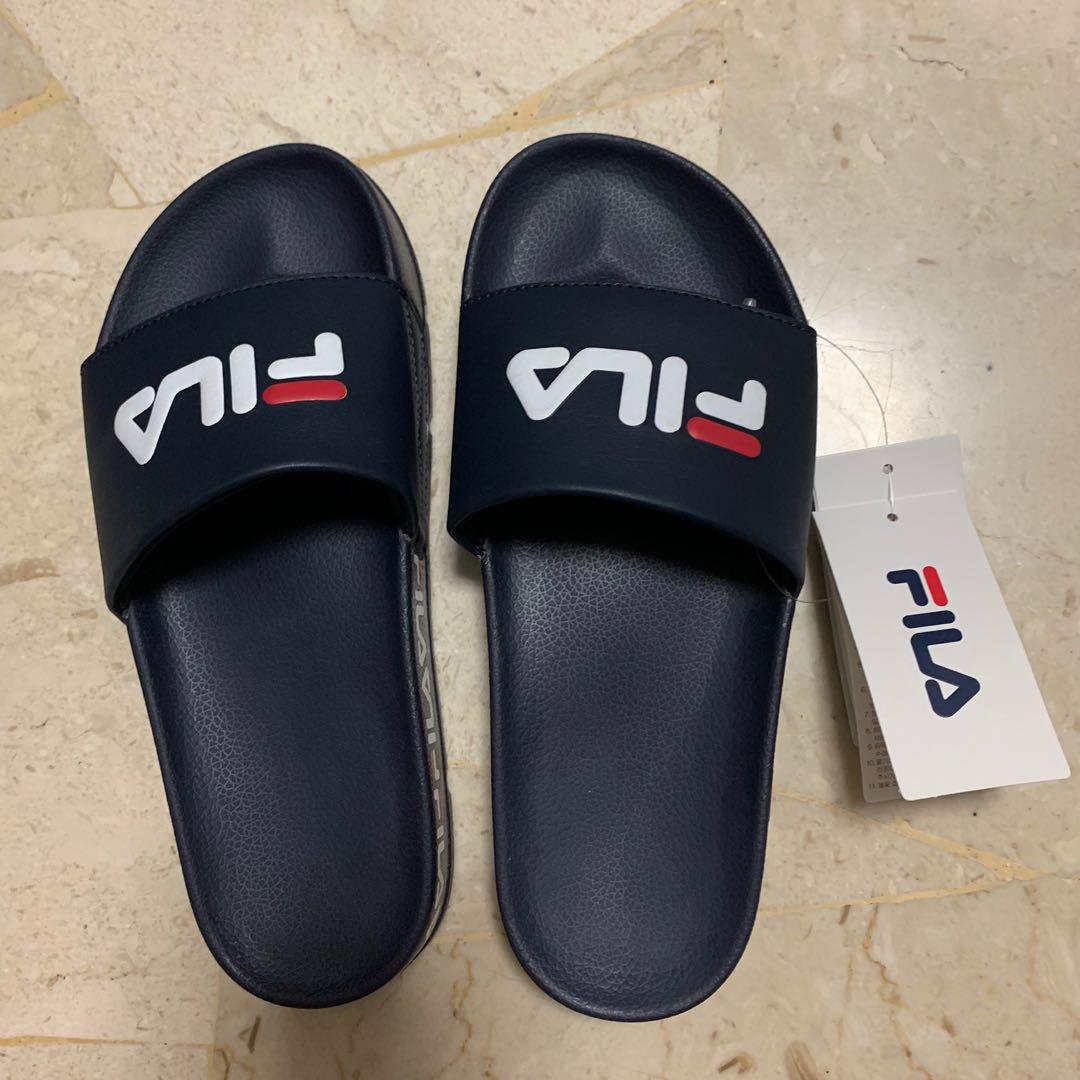 Fake fila slides discount