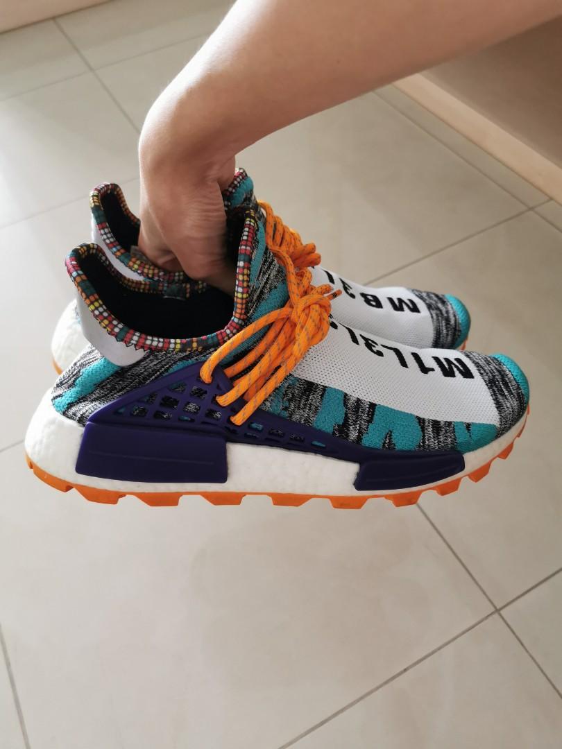 Adidas pharrell williams nmd hu solar pack orange, Men's Fashion, Footwear,  Sneakers on Carousell