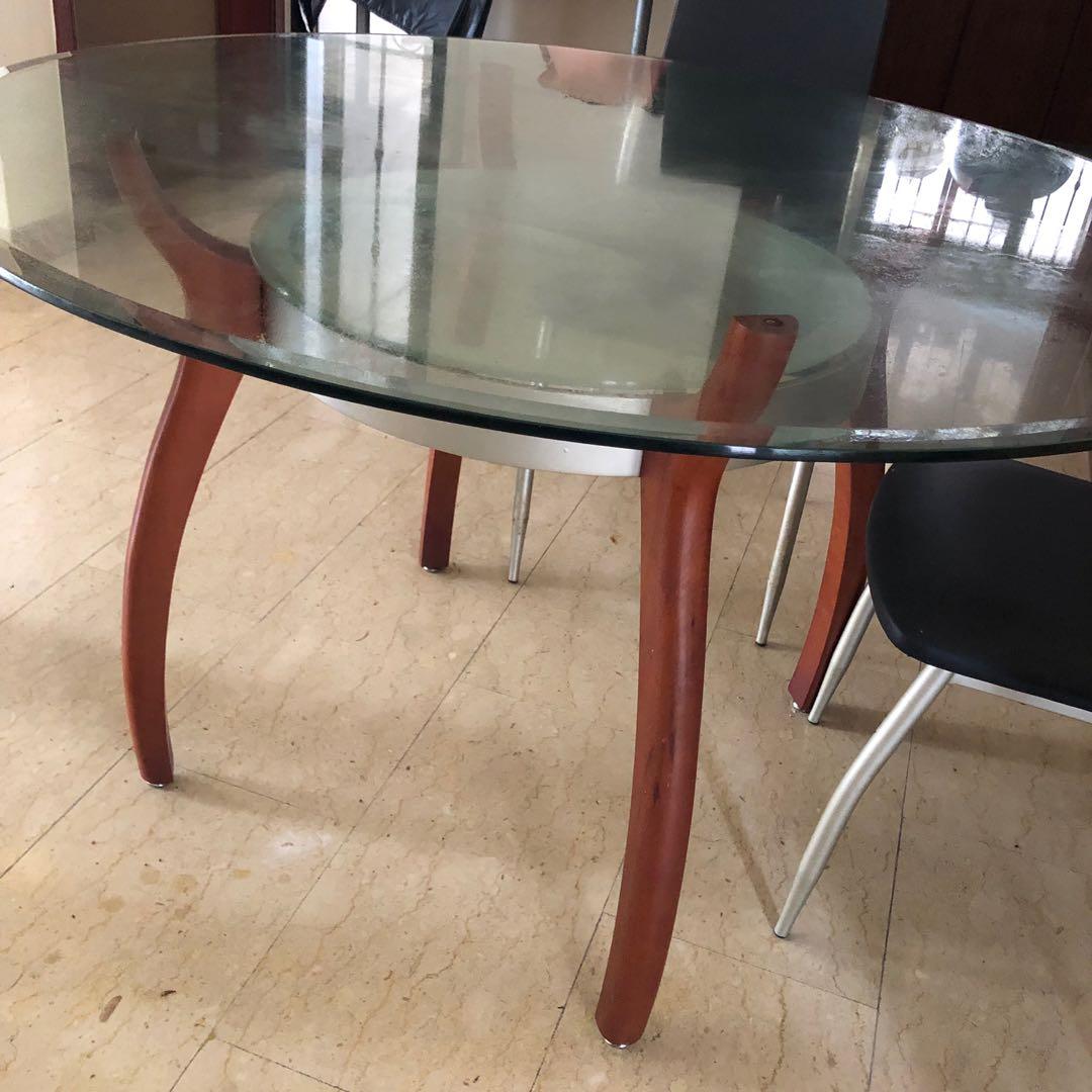 Dining Table (Category: Tables & Sets) located in Singapore. Submitted by barangbaranglelong (Listing ID 248767762, Image 2). Description: Round Glass Dining Table 122cm x 75cm Able to put 6 chairs. Collection at Jurong East. Arrange own transport..