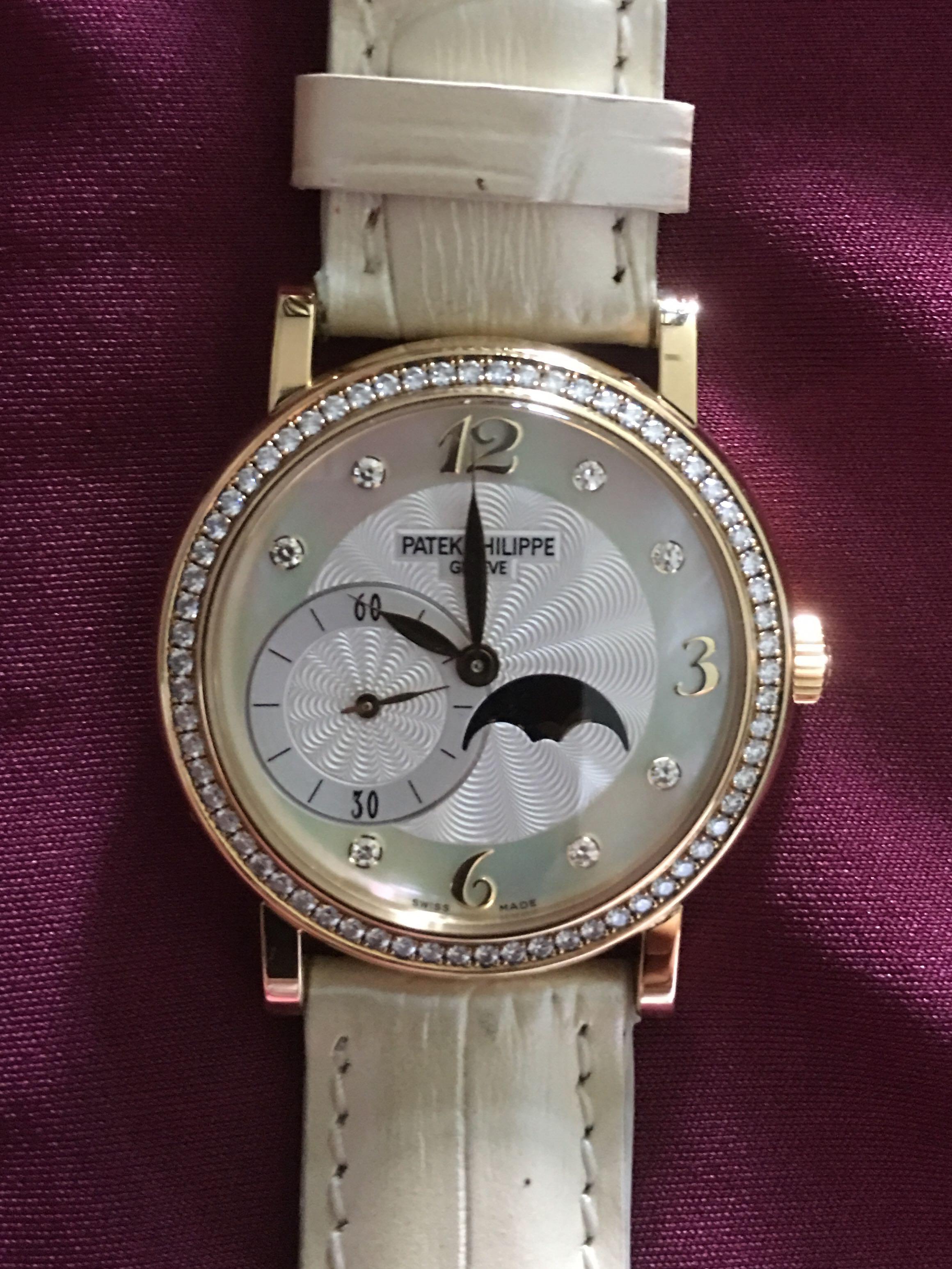 Patek Philippe Moonphase and diamonds woman s watch Ref 4958J 001