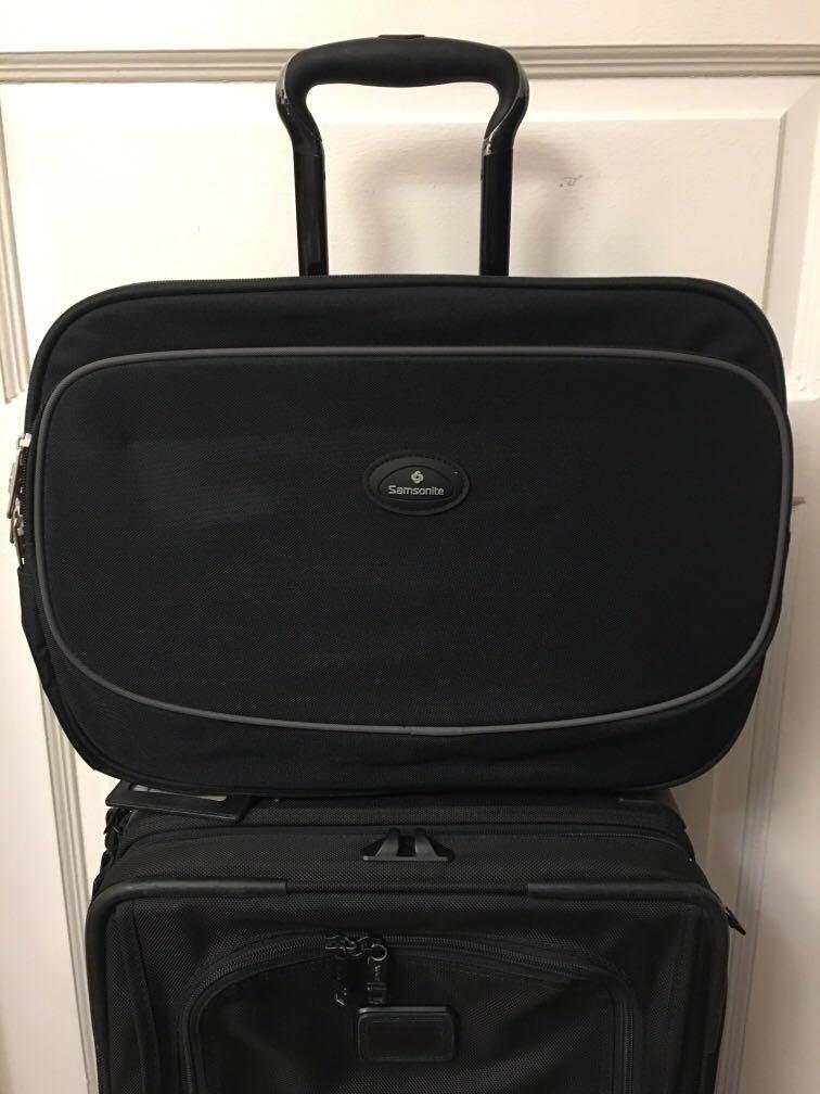 tumi overnight bag with wheels