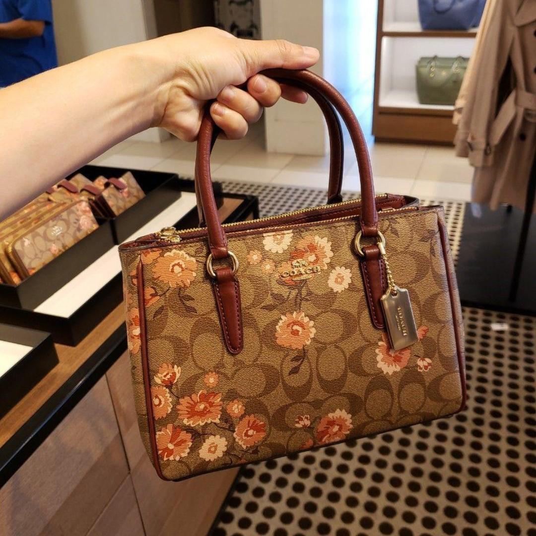 Coach Mini Surrey Carryall in Signature with Prairie Daisy Clutter Print Luxury Bags Wallets on Carousell