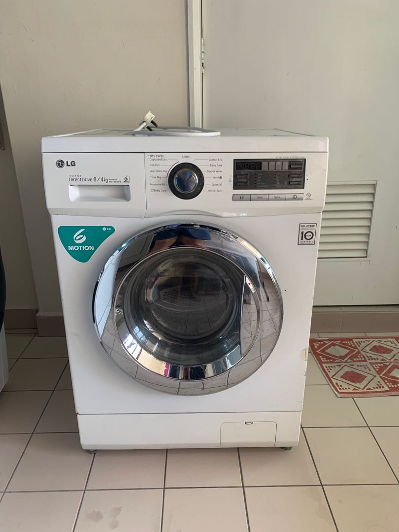 LG Washing Machine used. 8kg washing and 4kg drying, TV & Home