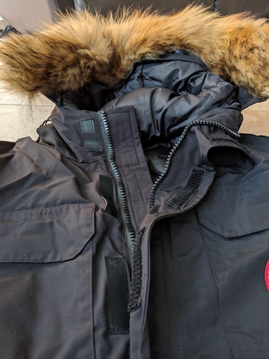 Winter jacket (Category: Coats, Jackets and Outerwear) located in Singapore. Submitted by ningz88 (Listing ID 249000292, Image 3). Description: Never worn, super thick winter jacket. Selling because larger than expected. Features: -Faux fur around the hood which is detachable - four front pockets (2 with zips, 2 with Velcro) - full zip and Velcro down the front of jacket to protect against wind - padded insides with adjustable string for a cinche