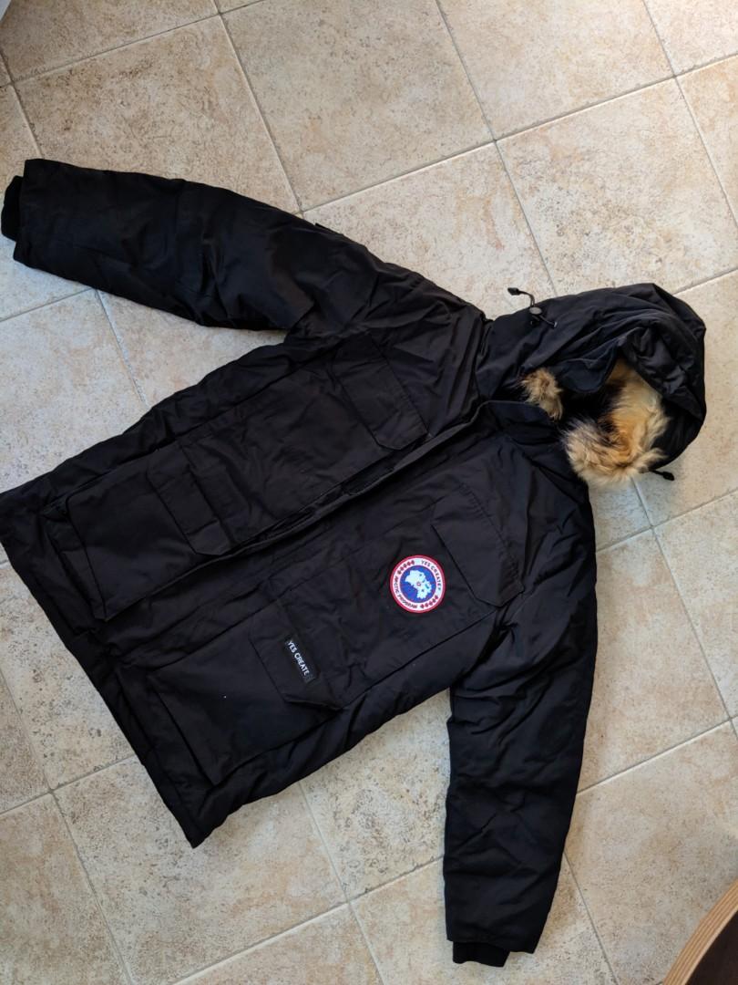 Winter jacket (Category: Coats, Jackets and Outerwear) located in Singapore. Submitted by ningz88 (Listing ID 249000292, Image 1). Description: Never worn, super thick winter jacket. Selling because larger than expected. Features: -Faux fur around the hood which is detachable - four front pockets (2 with zips, 2 with Velcro) - full zip and Velcro down the front of jacket to protect against wind - padded insides with adjustable string for a cinche