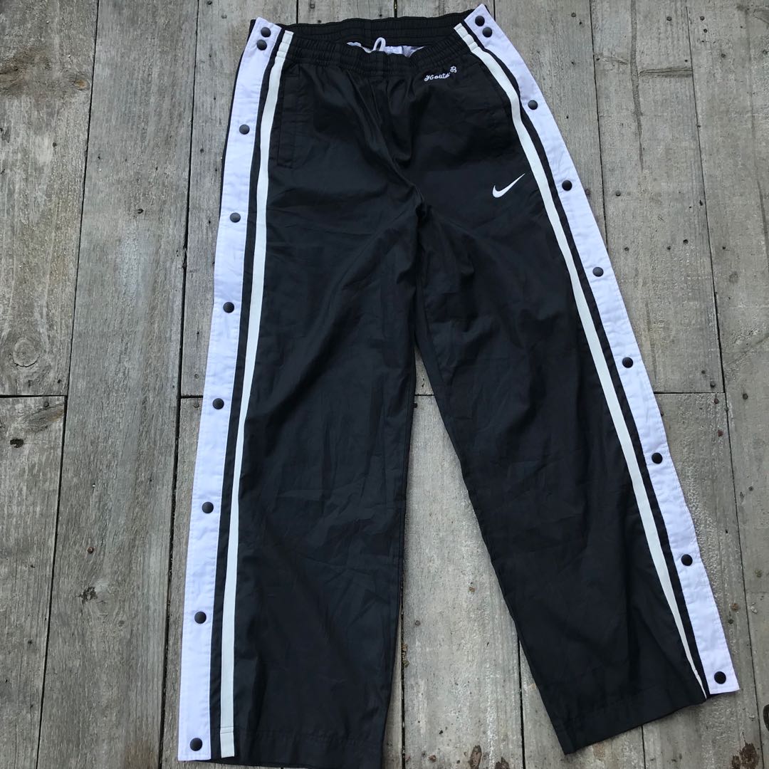 nike sweatpants with buttons on the side