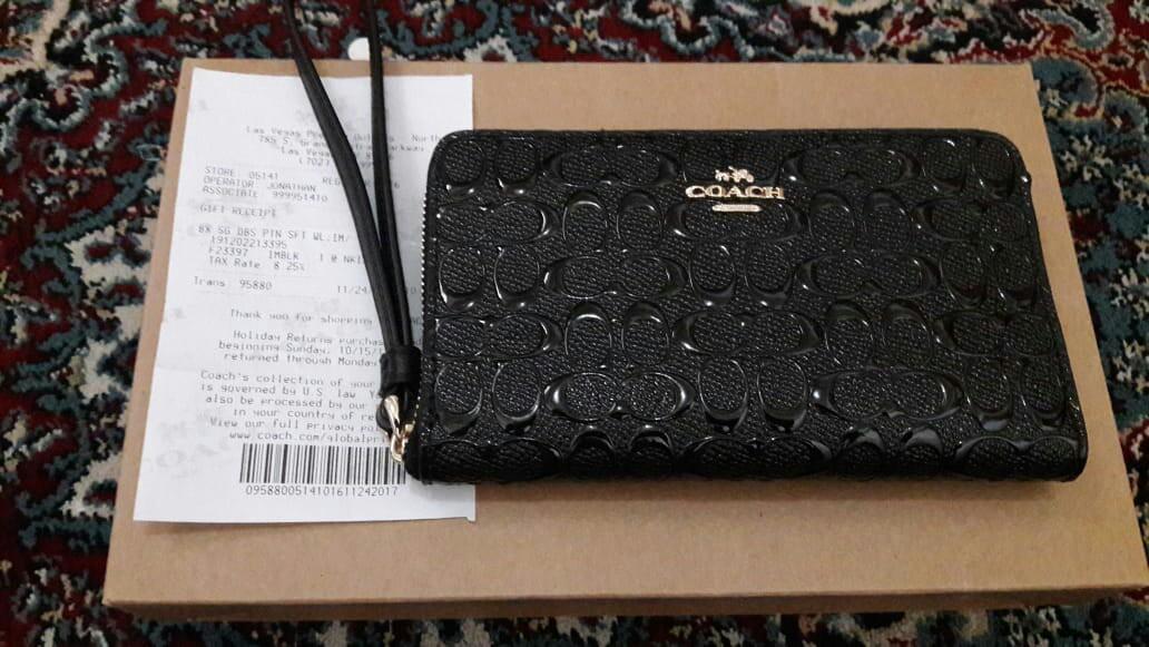 sale authentic coach signature embossed phone wallet clutch black