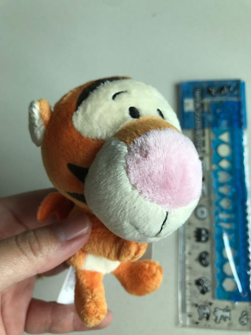 dog with big head and small body stuffed animal