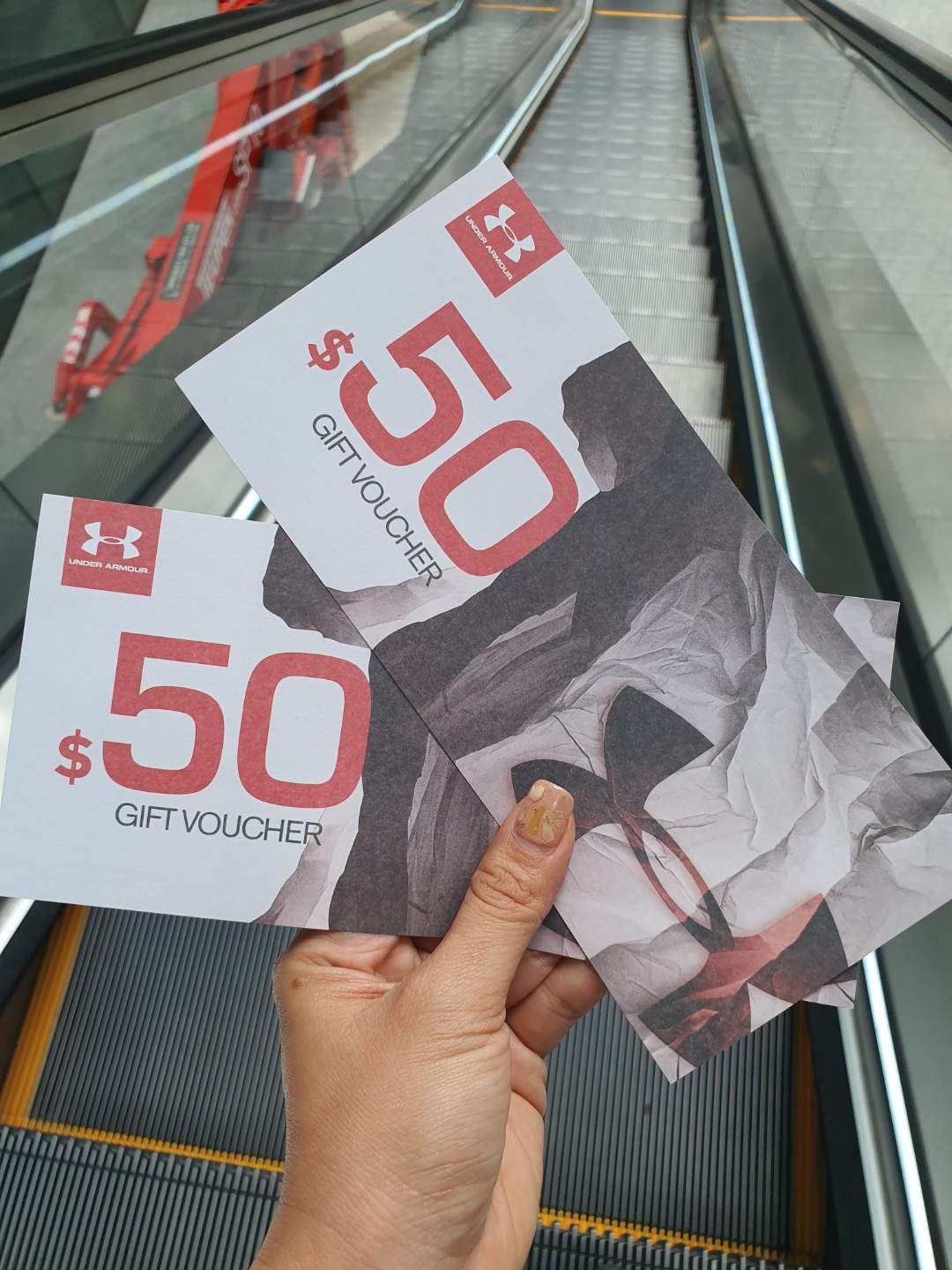Under Armour 100 voucher, Tickets & Vouchers, Vouchers on Carousell