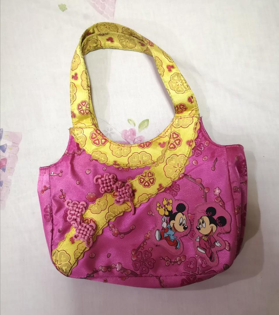 Mickey & Minnie Hand Bag (Category: Diaper Bags & Wetbags) located in Quezon City. Submitted by ddeonz (Listing ID 249398955, Image 1). Description: >Bought in HK Disneyland >Has flaws (see 3-4th pic) >Still in good condition.