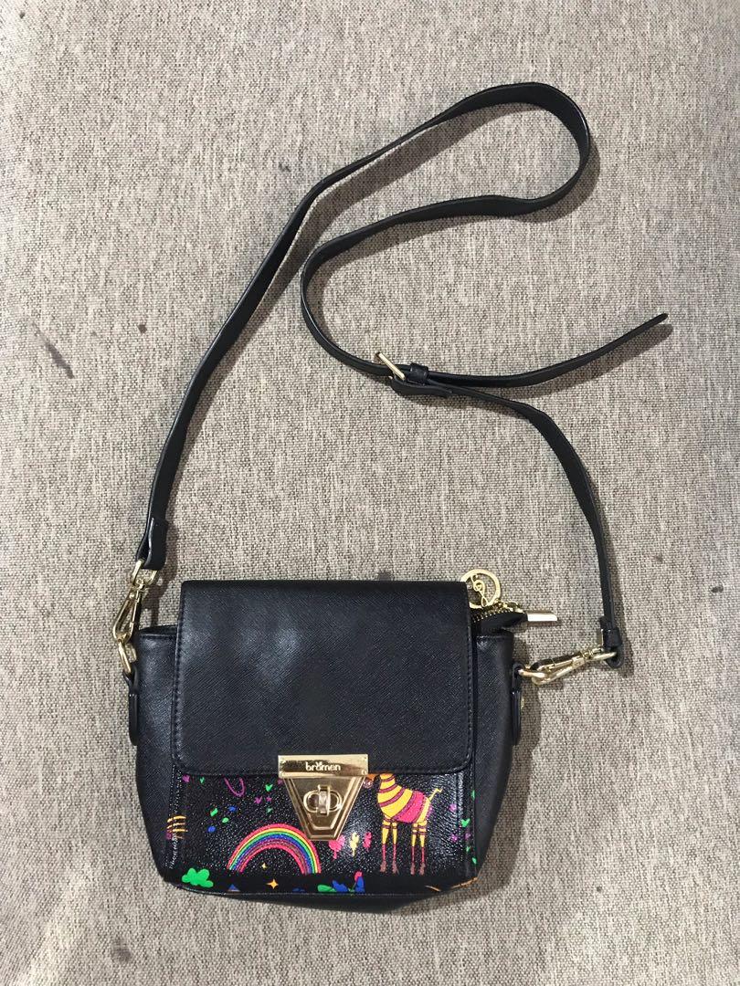 Authentic Bromen Mini Sling Bag (Category: Cross-body Bags) located in Quezon City. Submitted by good.idea (Listing ID 249810822, Image 1). Description: Original Bromen Mini Sling bag No flaw Minimal signs of usage only Genuine Saffiano Leather Gold hardwares Can fit medium wallet and plus size cp Last price posted.