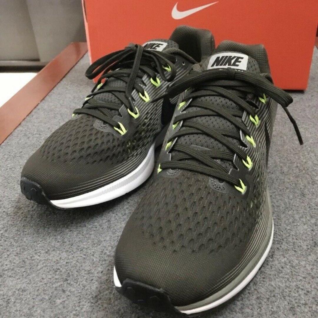 dark green nike running shoes