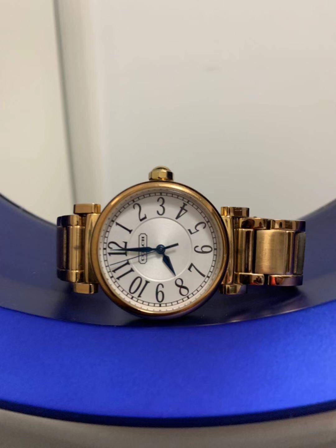 gold designer watch
