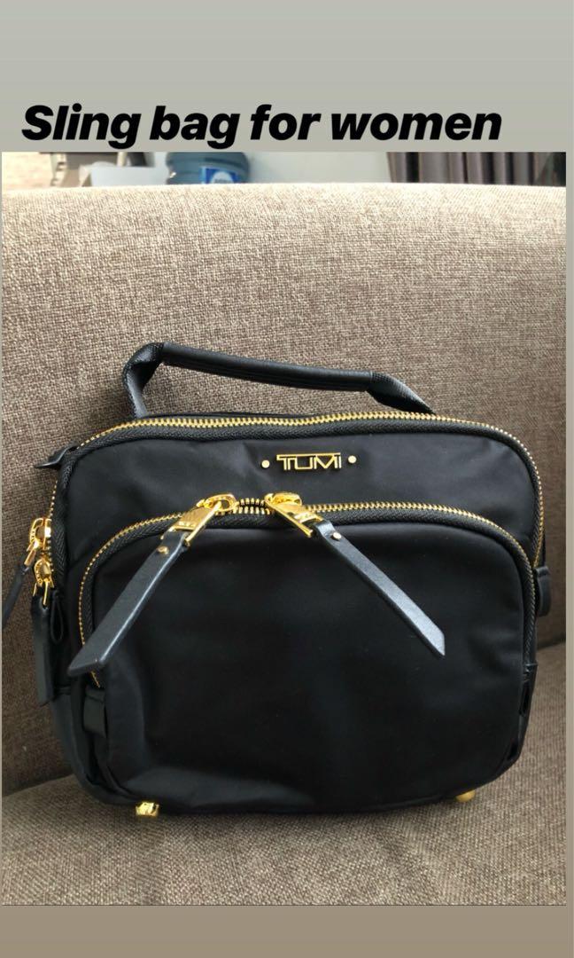 Tumi sling bag ladies top
