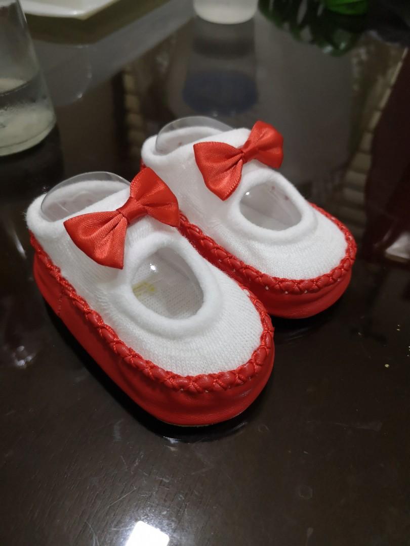 Unisex Red Festive Pre-Walker Shoes (Category: Babies & Kids Fashion) located in Manila. Submitted by jamchez (Listing ID 249915733, Image 2). Description: USED ONCE ONLY (DURING BABY'S CHRISTENING)!!! BABY JUST SEATED THE WHILE TIME, HE COULDN'T WALK YET Features: *Soft cotton fabric makes baby feel comfortable *Perfect for daily wear and easy to wear/ remove *Perfect for patries and other special occasions *Gender: Unisex *Size: Small (13 cm) *