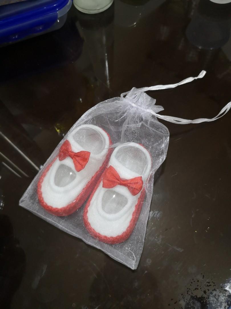 Unisex Red Festive Pre-Walker Shoes (Category: Babies & Kids Fashion) located in Manila. Submitted by jamchez (Listing ID 249915733, Image 3). Description: USED ONCE ONLY (DURING BABY'S CHRISTENING)!!! BABY JUST SEATED THE WHILE TIME, HE COULDN'T WALK YET Features: *Soft cotton fabric makes baby feel comfortable *Perfect for daily wear and easy to wear/ remove *Perfect for patries and other special occasions *Gender: Unisex *Size: Small (13 cm) *