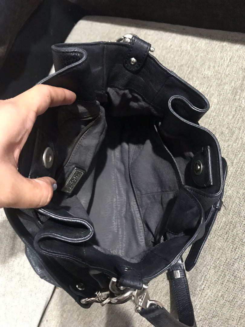 Authentic Louis Quatorze 2way bucket bag (Category: Luxury Bags & Wallets) located in Quezon City. Submitted by good.idea (Listing ID 250082741, Image 3). Description: Original LQ 2way bucket bag Genuine leather Medium size Magnetic button closure Zipper in the pocket inside is not working (no flaw aside from it) But still in excellent used condition .