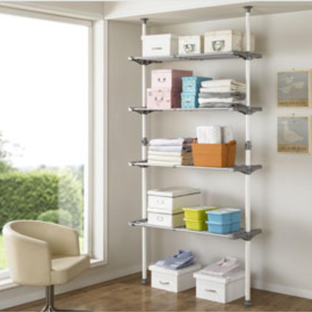 Four-level width-adjustable shelf (Category: Shelves, Cabinets & Racks) located in Singapore. Submitted by safeearth.f17f75 (Listing ID 250064391, Image 1). Description: Used condition, 8/10. .