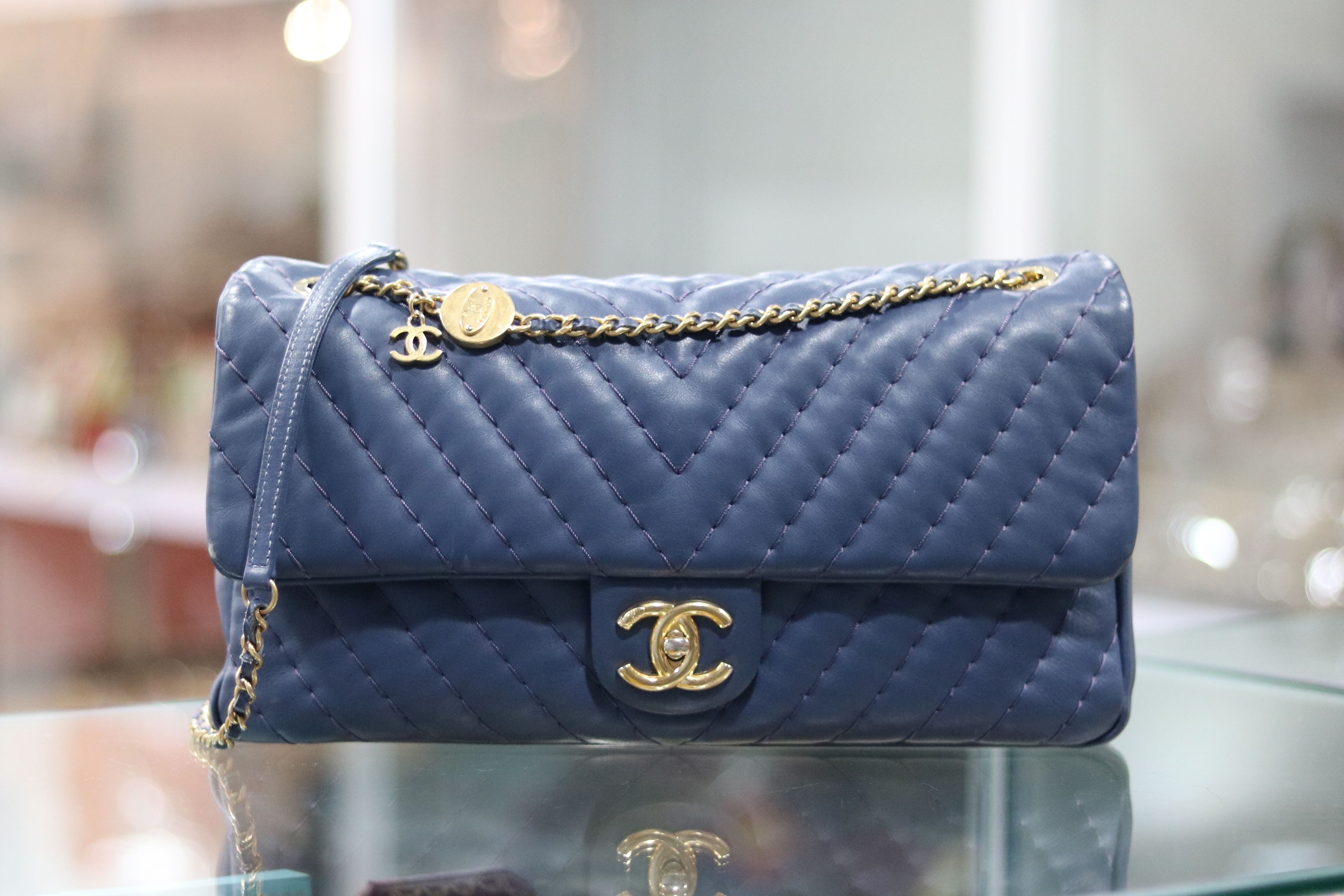 Chanel Medallion Charm Flap Bag, Luxury, Bags & Wallets on Carousell