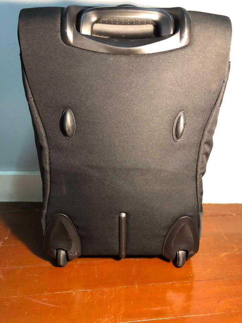 Crumpler duffel bag with wheels (Category: Backpacks) located in Mandaluyong City. Submitted by bonibuys (Listing ID 250380276, Image 3). Description: Crumpler duffel bag with wheels - black with red inner lining - retractable handle .