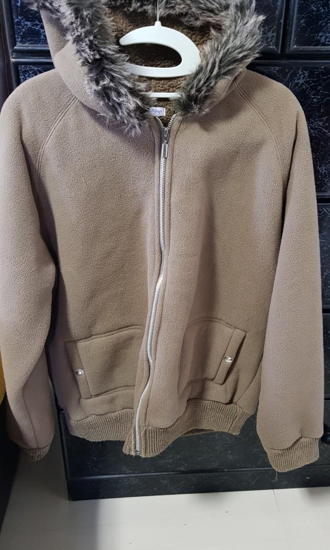 Winter Jacket (Category: Coats, Jackets and Outerwear) located in Singapore. Submitted by ives3838 (Listing ID 250285745, Image 1). Description: Winter jacket with bonnet hat size: chest 112cm x sleeve 69cm.