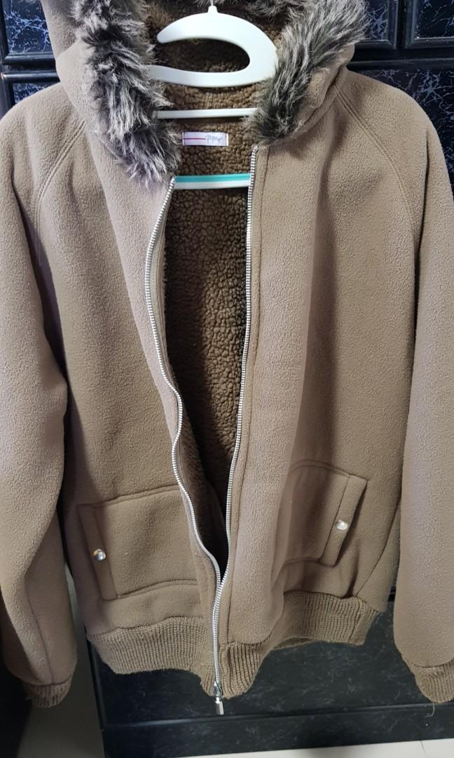 Winter Jacket (Category: Coats, Jackets and Outerwear) located in Singapore. Submitted by ives3838 (Listing ID 250285745, Image 2). Description: Winter jacket with bonnet hat size: chest 112cm x sleeve 69cm.