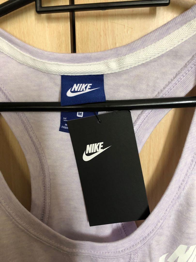 Nike ladies workout top (Category: Activewear) located in Manila. Submitted by coletski (Listing ID 250416768, Image 2). Description: Brand new wih tag Size: Medium.