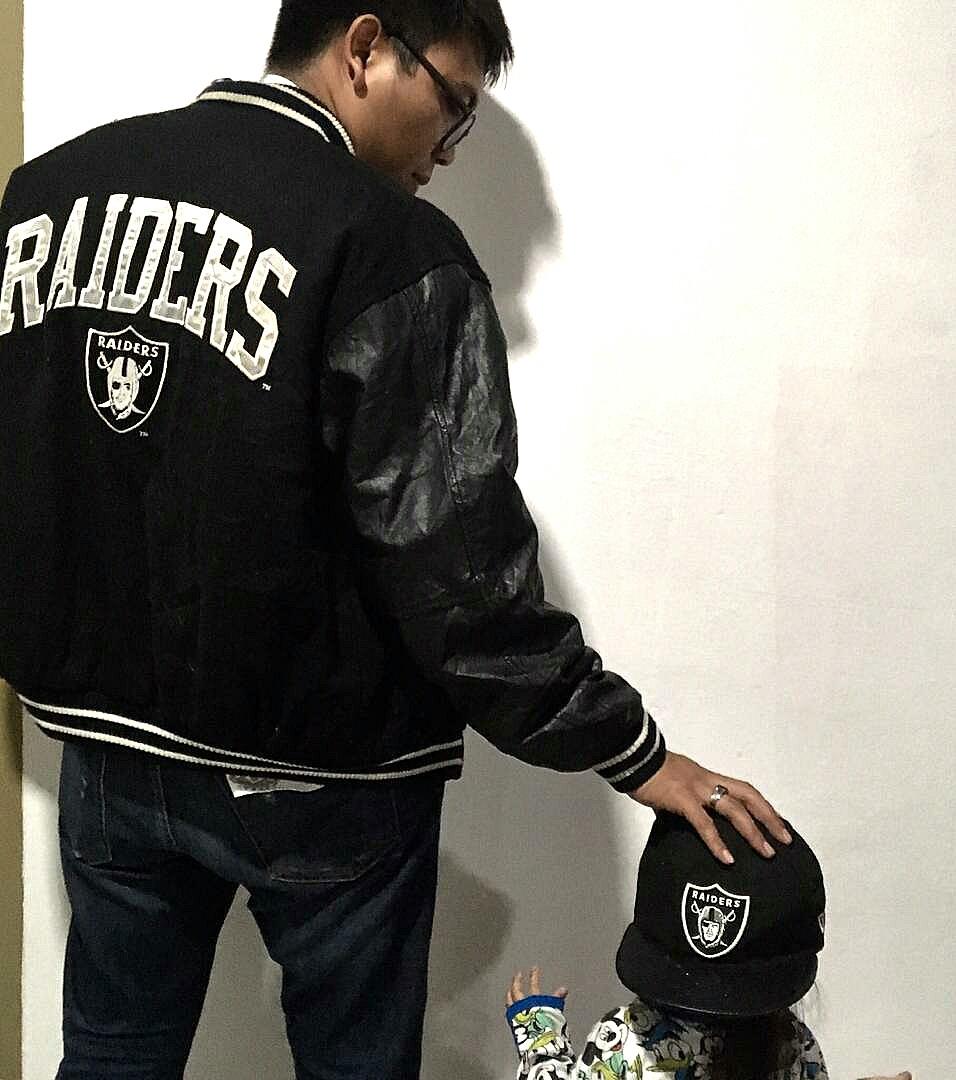 Varsity jacket raiders and new era cap