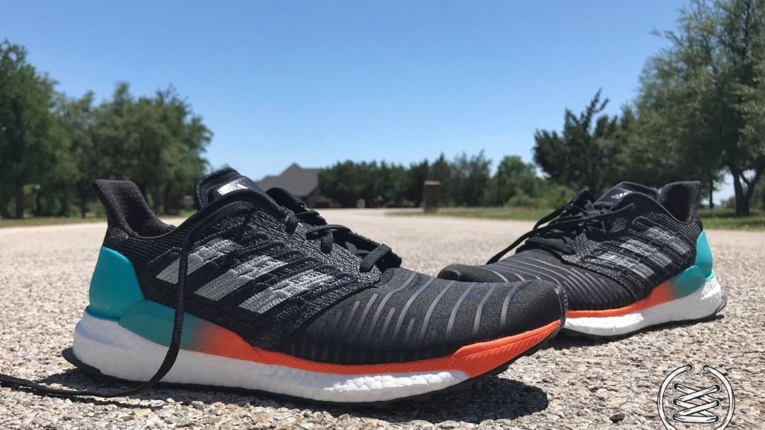 adidas boost black and orange