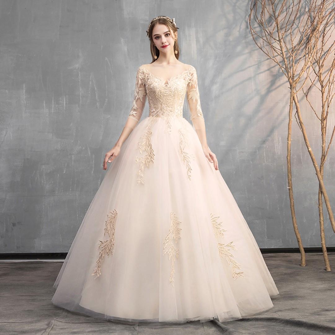 Cream long hot sale sleeve wedding dress