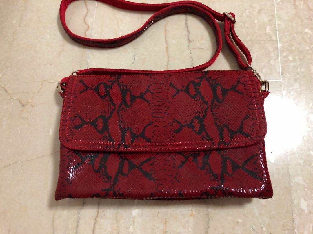 Red snake print best sale bag