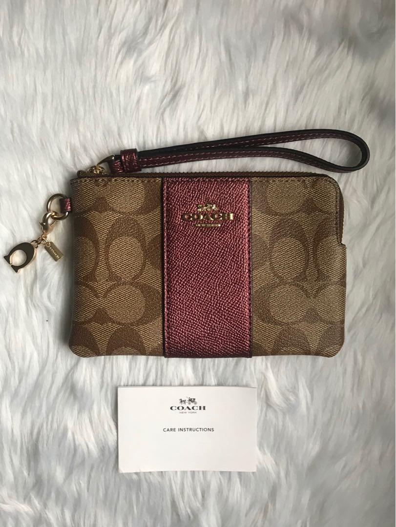 coach wristlet with charms