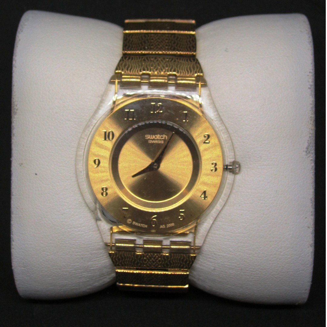 Swatch Ultra Thin Ladies Gold Finish Never Used out of box