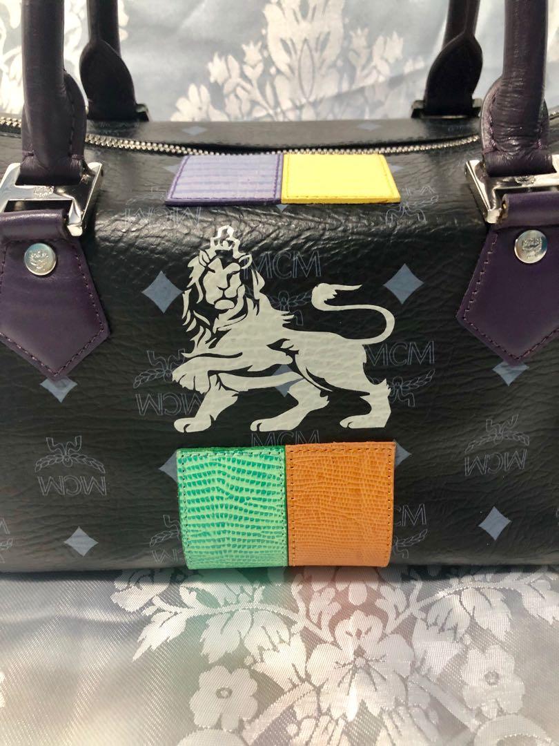 MCM Visetos Princess Lion Leather Boston Bag (SHG-31992) – LuxeDH