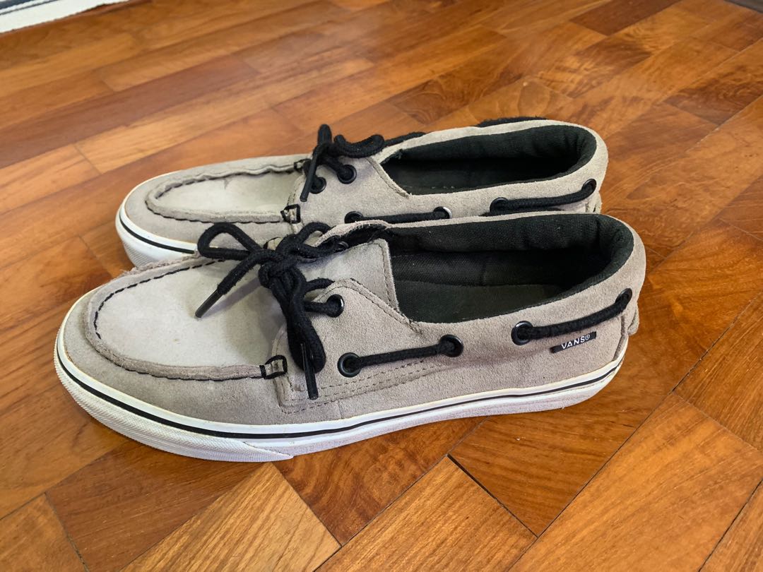 vans boat shoes on feet