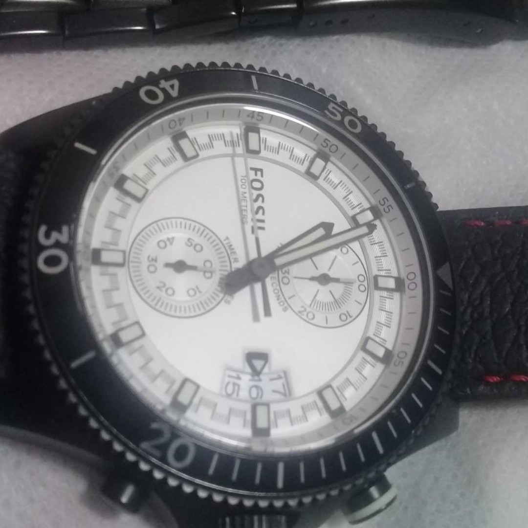 fossil or armani exchange watches