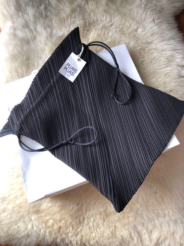 Issey miyake drawstring bag top