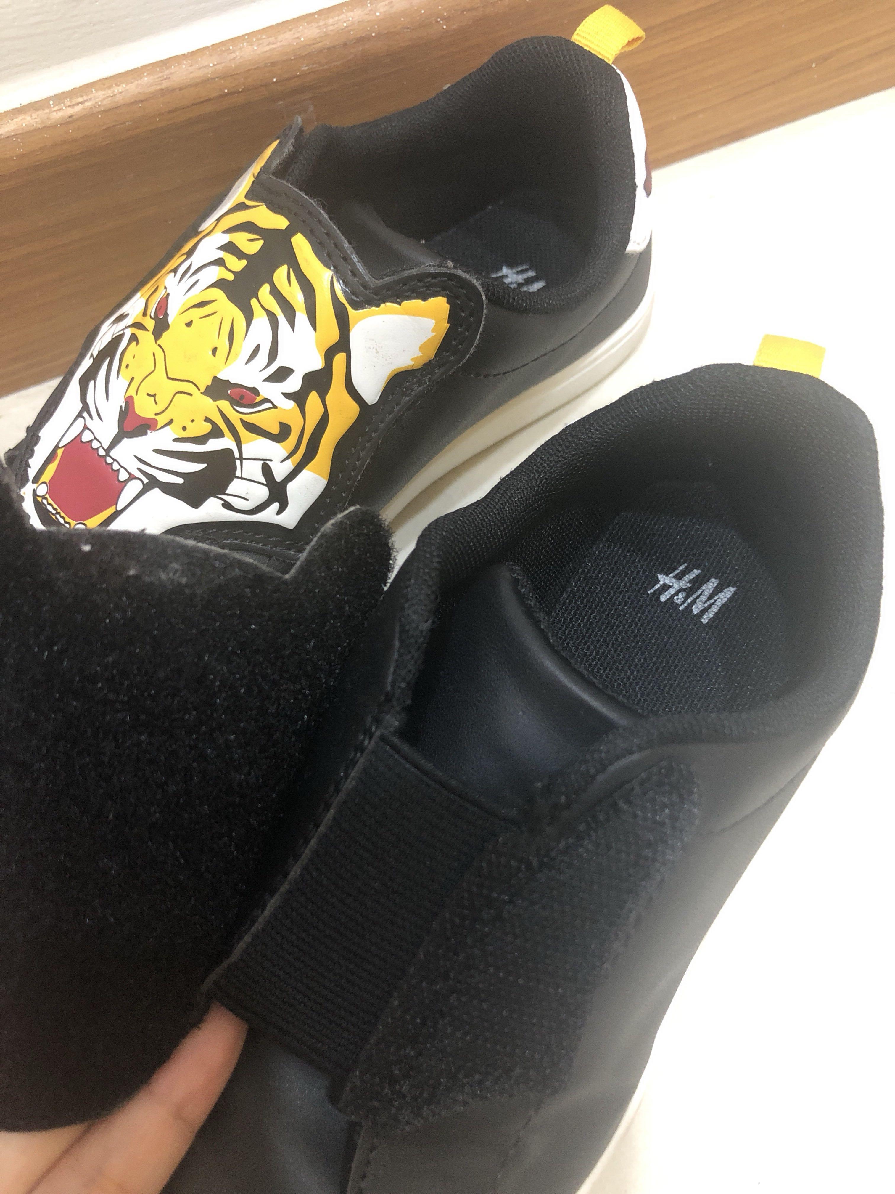 [Preloved] H&M tiger shoes (Category: Babies & Kids Fashion) located in Singapore. Submitted by allthings4sale (Listing ID 251560017, Image 2). Description: Only worn for only 2-3 times As good as new Sole Measures 20cm Long Prefer meet up as item is bulky .