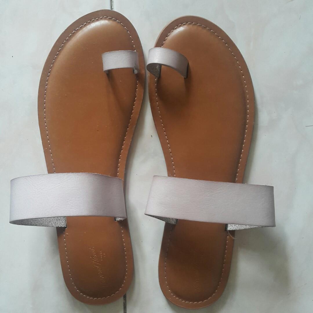 Flat sandals (Category: Flats & Sandals) located in Iloilo. Submitted by brandedpreloved_stuff (Listing ID 251656341, Image 1). Description: Still new.