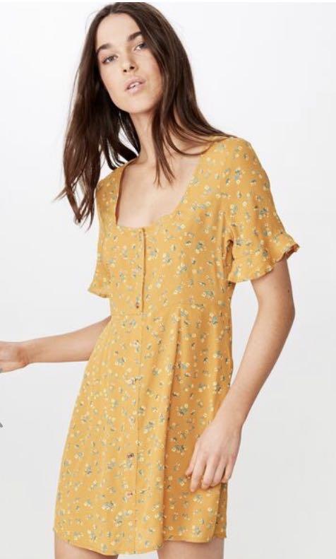 mustard floral tea dress Cinosural International School