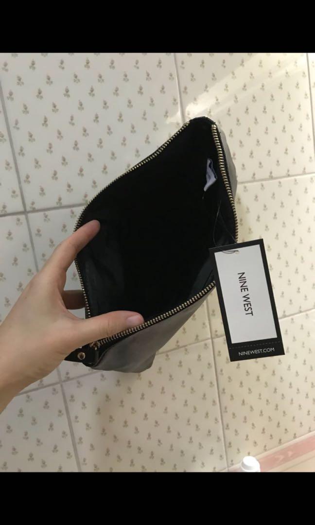 Nine West Black Clutch Bag (Category: Clutches) located in Cebu City. Submitted by cookieyoung (Listing ID 252126320, Image 3). Description: AUTHENTIC NEVER USED .