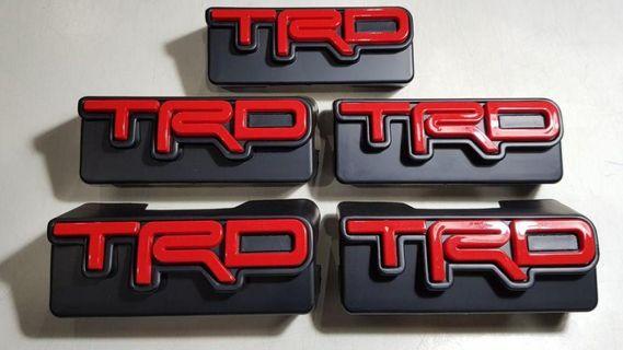 TRD logo emblem embossed grille trunk fender red plastic