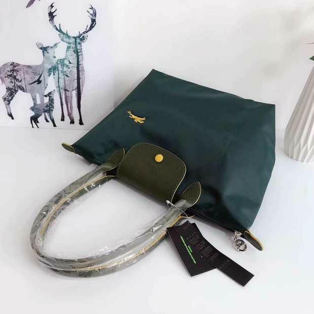 Longchamp Long Handle in Jewel Green Luxury Bags Wallets on