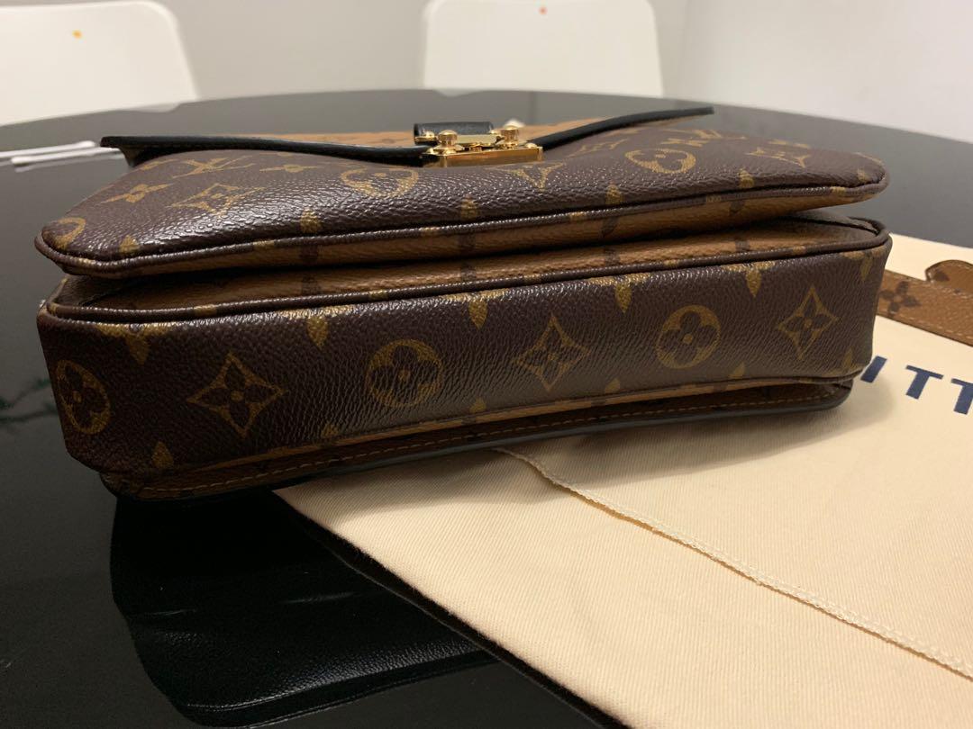 Exchanged my Pochette Metis - did I get a used one? The zipper is scratched  and the handle looks scratched as well. Didn't notice in the store. I also  feel like the