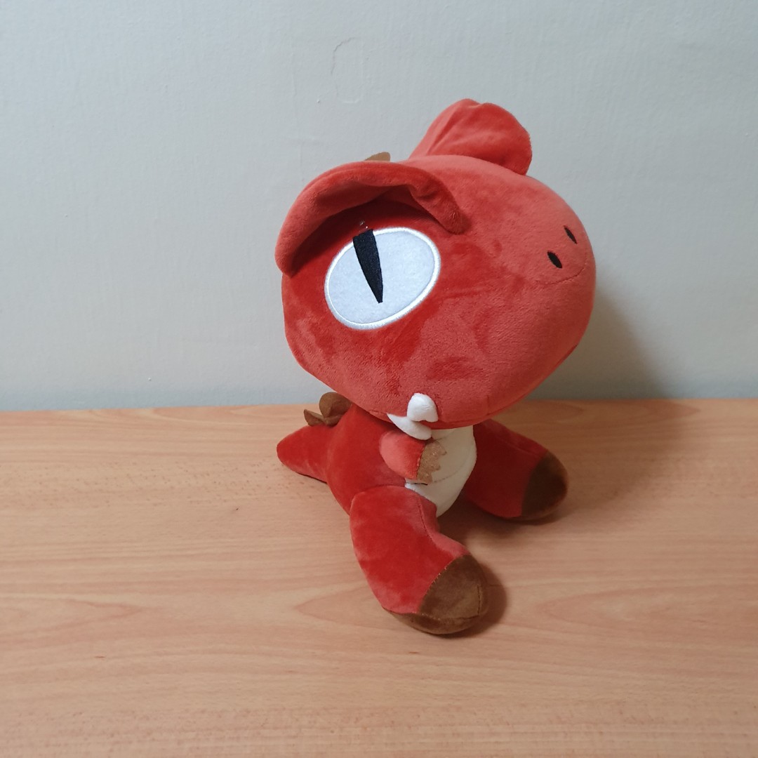 red dinosaur plush