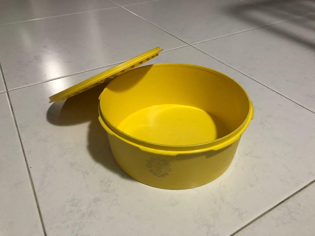 Tupperware Container (Category: Food Organisation & Storage) located in Singapore. Submitted by warehouseraider (Listing ID 252534274, Image 2). Description: Yellow round container Good for cookies.