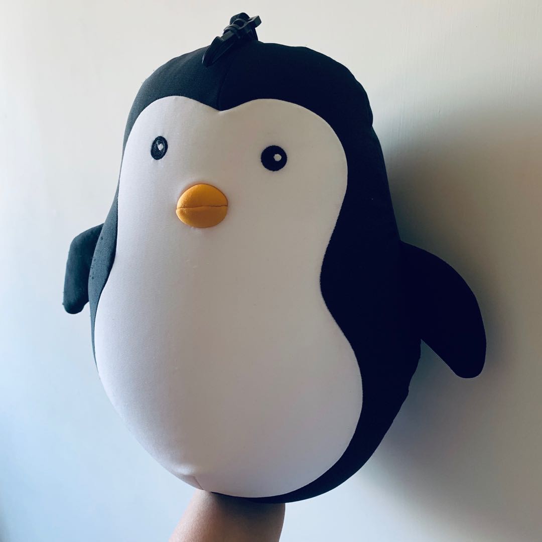 kikkerland travel pillow penguin