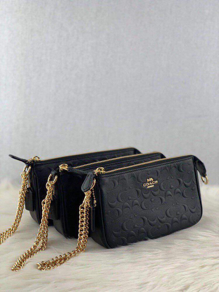 Coach Large Wristlet 19 Signature Debossed in Black, Luxury, Bags & Wallets  on Carousell