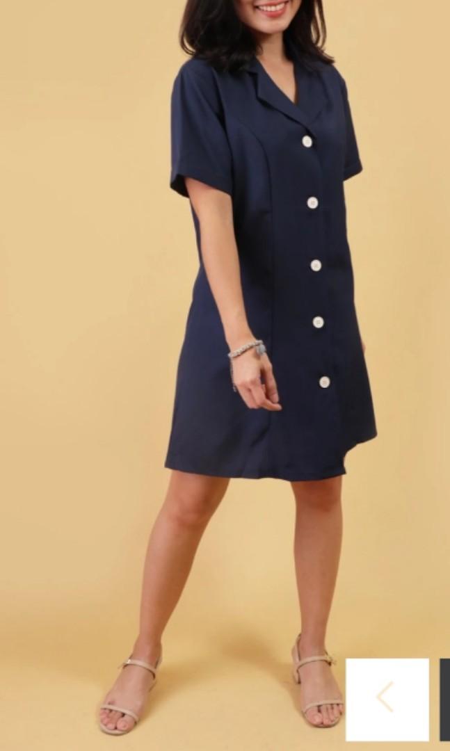 Fifi Button Down Shirt Dress in Navy Blue (Category: Dresses) located in Makati City. Submitted by cqmpreloved (Listing ID 252828148, Image 1). Description: Free Size Quality, Silky, Polycotton Blend Fabric Material has no stretch Functional buttons Style Tip: Start your work week right with some loafers and a leather bag Pro/s: Can also be worn as a cover up Measurements (Will fit standard XS-L frames) CHEST - 38” / ARMHOLE - 18” / SHOULDER -16”