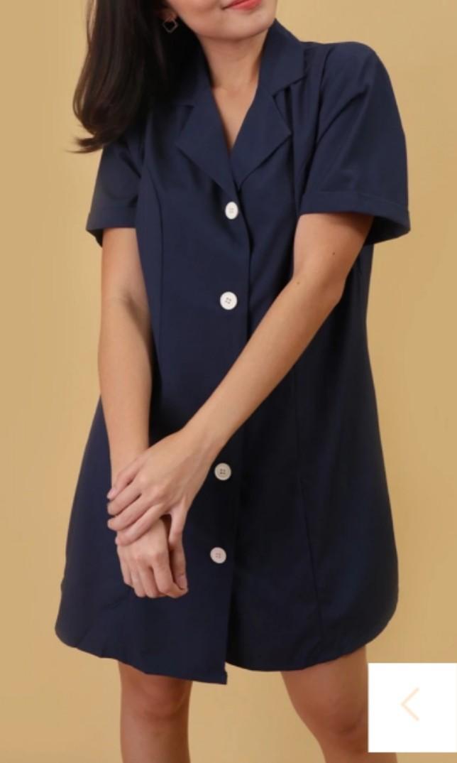 Fifi Button Down Shirt Dress in Navy Blue (Category: Dresses) located in Makati City. Submitted by cqmpreloved (Listing ID 252828148, Image 2). Description: Free Size Quality, Silky, Polycotton Blend Fabric Material has no stretch Functional buttons Style Tip: Start your work week right with some loafers and a leather bag Pro/s: Can also be worn as a cover up Measurements (Will fit standard XS-L frames) CHEST - 38” / ARMHOLE - 18” / SHOULDER -16”